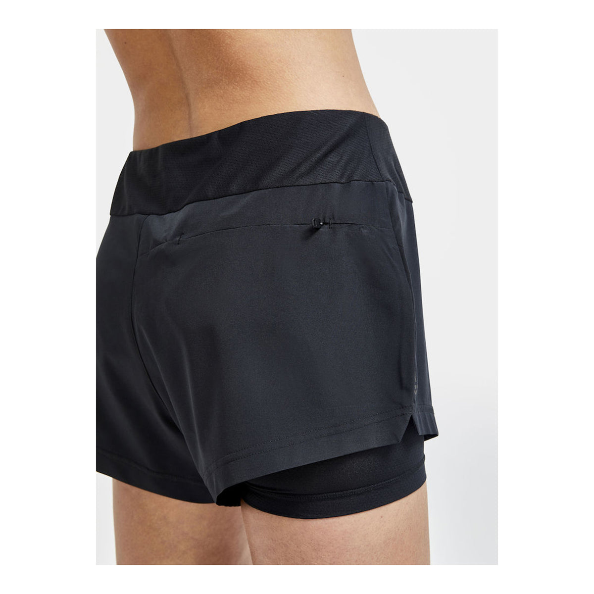 CRAFT ADV ESSENCE 2 EN 1 SHORT - FEMME