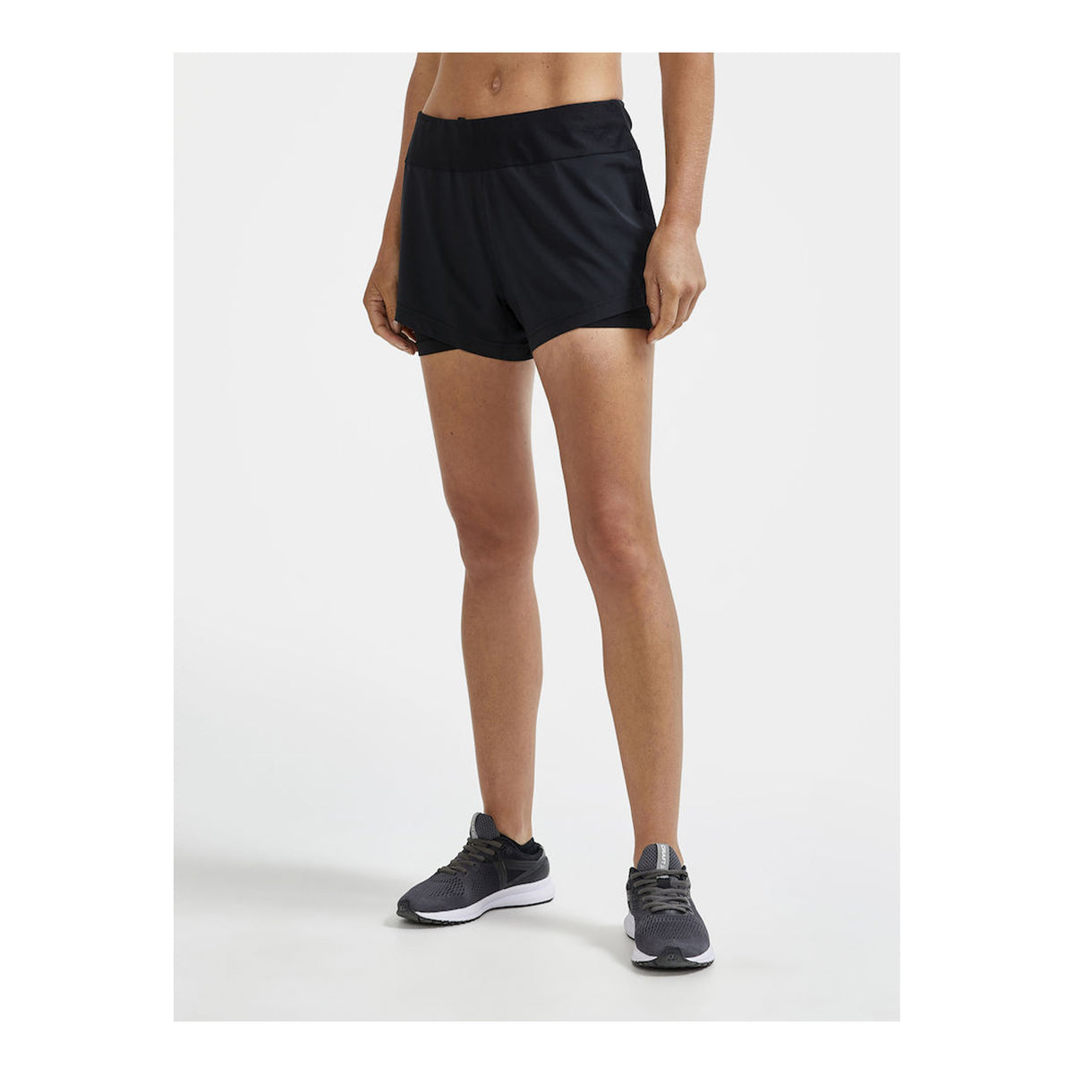 CRAFT ADV ESSENCE 2 EN 1 SHORT - FEMME